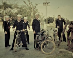 Navy sailors on bicycles circa 1956